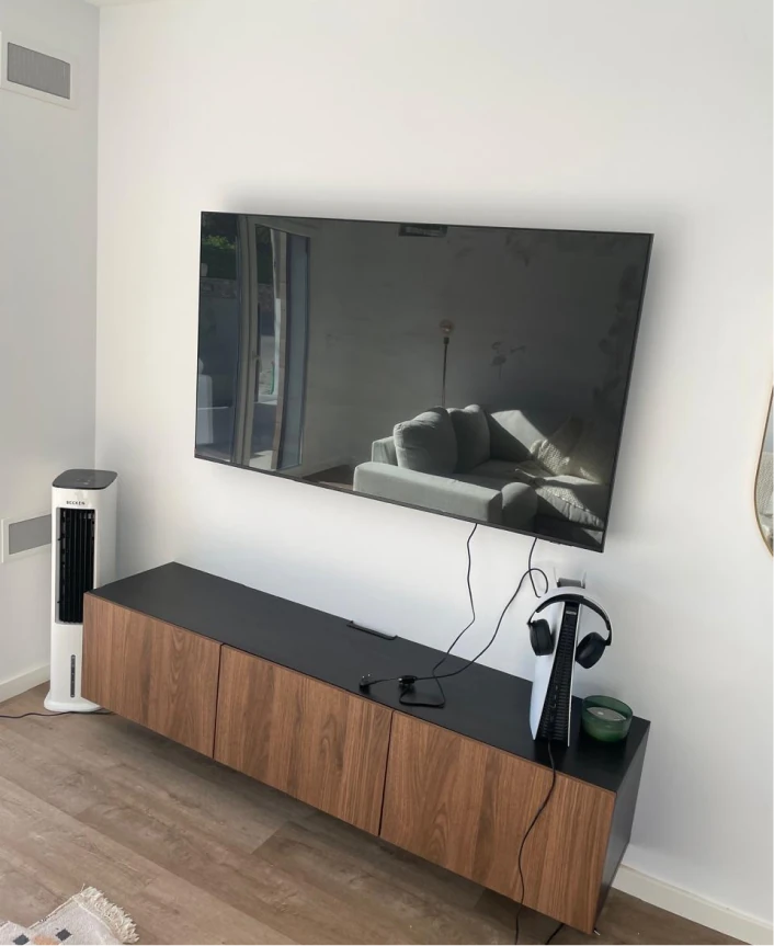 Wall-mounted TV installation